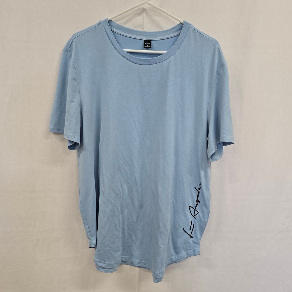 Manfinity Mens Los Angeles Graphic T-Shirt Light Blue Curved Hem Size Large